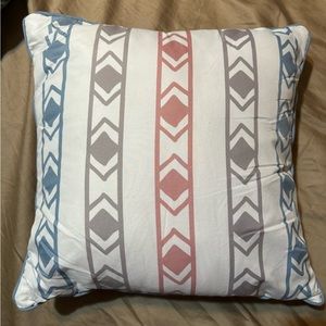 NWOT throw pillow. Light gray w/ blue, gray, and pink design.